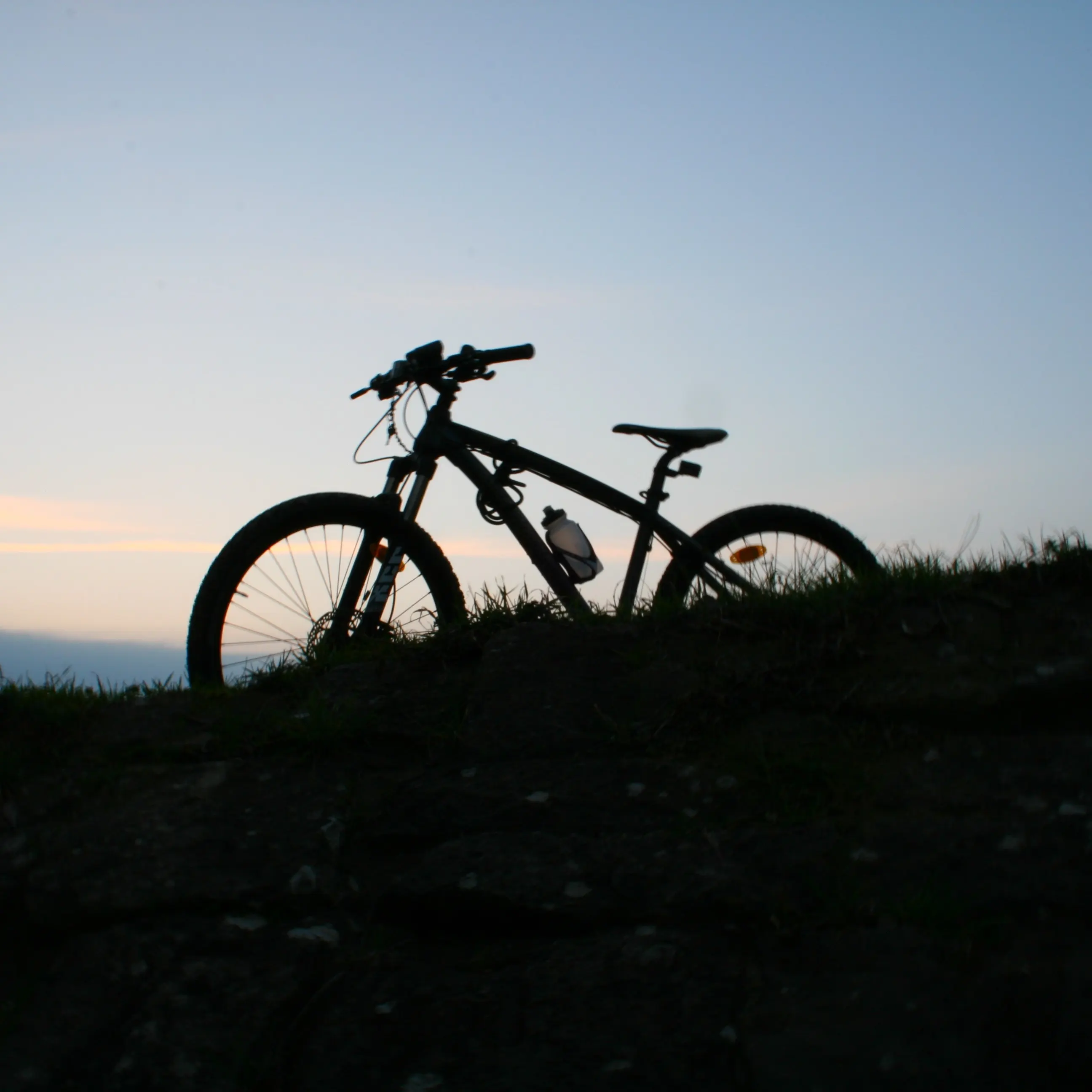 An enticing snapshot featuring a biking enthusiast with a bicycle, highlighting one of the enjoyable activities to be experienced in this location.